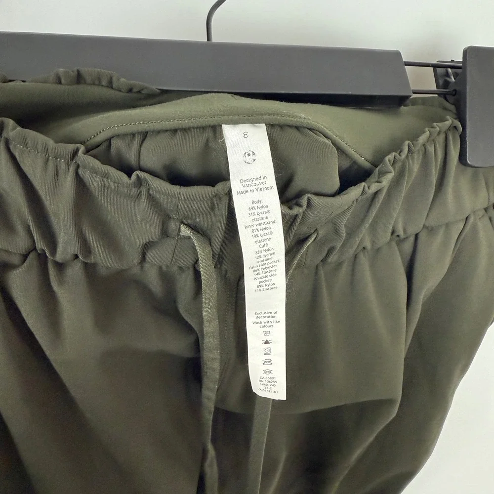 Lululemon On The Fly Jogger Dark‎ Olive Green Elastic Waist Size 8 FLAWED